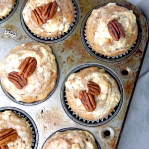 Hummingbird muffins in a muffin tin.