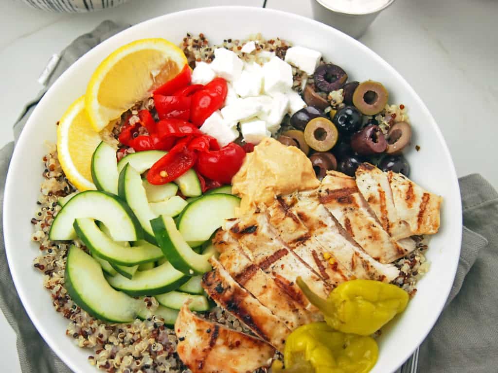 Chicken on top of quinoa with vegetables