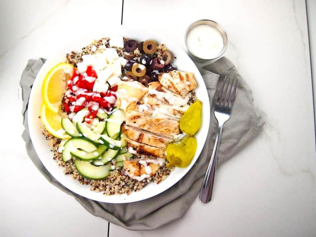 Overview of chicken bowl with vegetables and quinoa