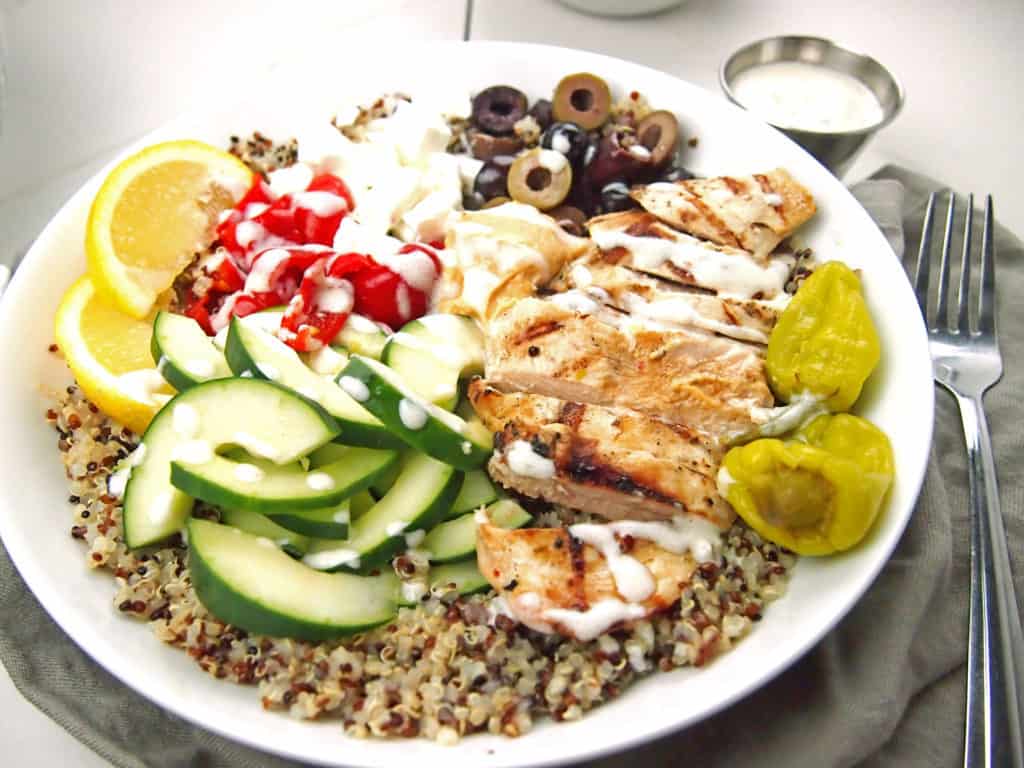 Close up of chicken bowl with vegetables and quinoa