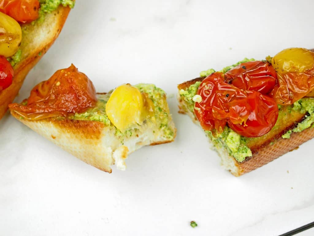 Tomato bruschetta with a bite taken