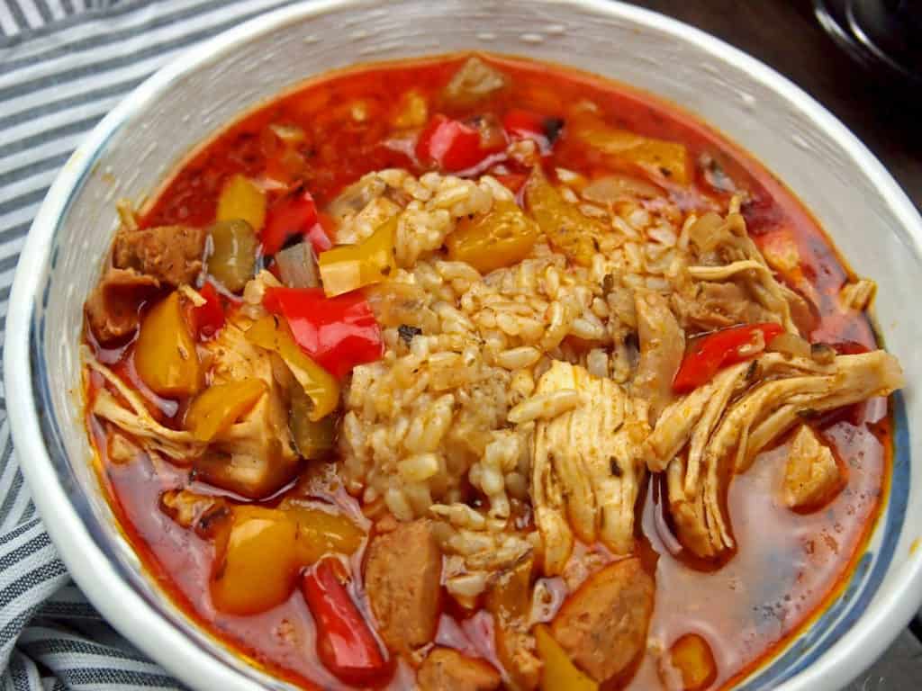 side view chicken gumbo with sausage and bell peppers