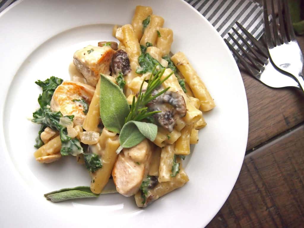 View of Chicken, mushroom, and kale pasta bake with sage and rosemary