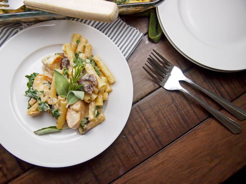 View of Chicken, mushroom, and kale pasta bake with sage and rosemary