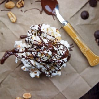 Popcorn cluster with peanuts and chocolate drizzle