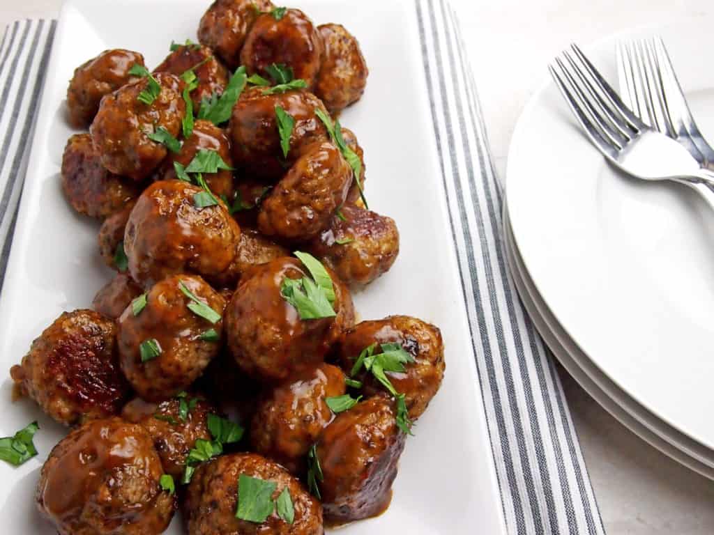 Overview of chicken marsala meatballs with parsley garnish