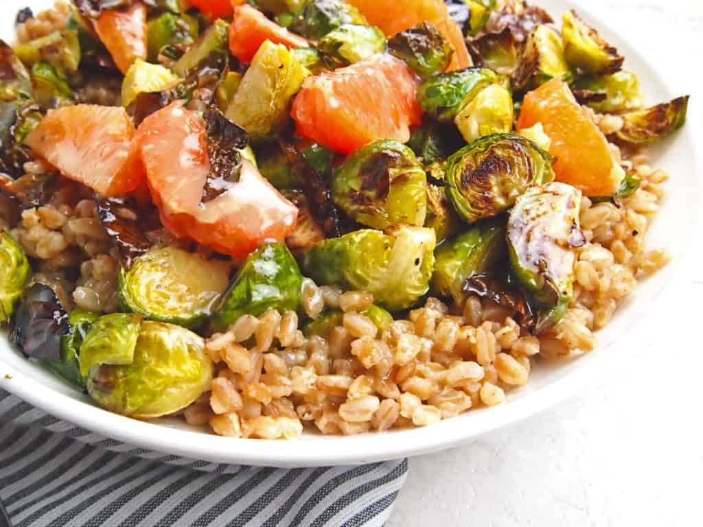 Close up of farro salad with brussels sprouts and citrus