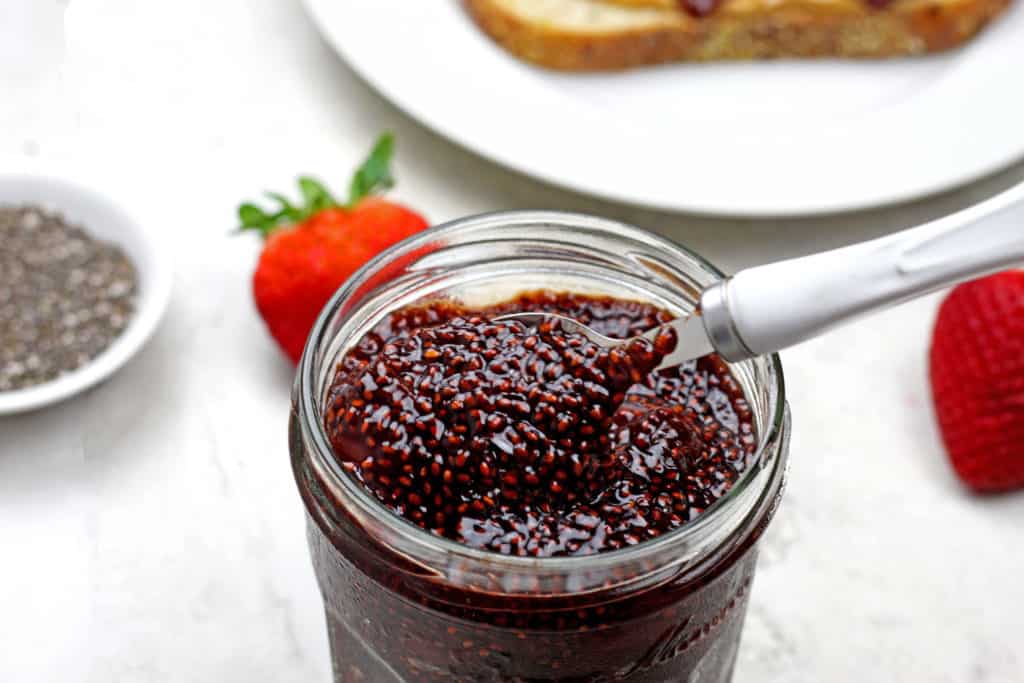 Balsamic Strawberry Chia Jam in a chia with a spoon