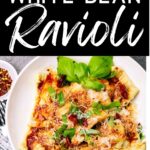Pinterest image of the ravioli with the words "Sun-Dried Tomato and White Bean Ravioli" in text overlay.