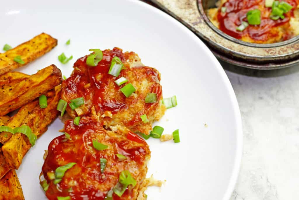 Close up of Mini Chicken Meatloaves with Pineapple BBQ Sauce on a plate