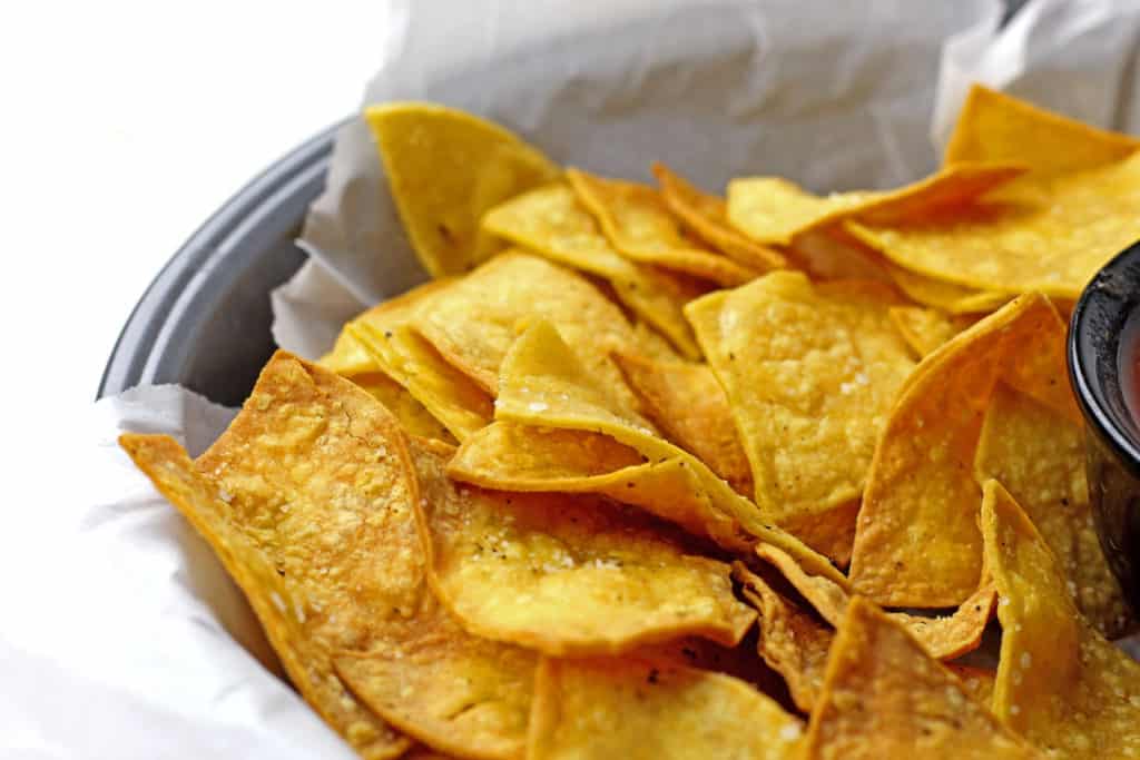 Close up of a basket of air fryer tortilla chips