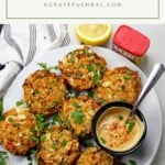 Pinterest photo of crab cakes with sauce and text that says "Air Fryer Crab Cakes"
