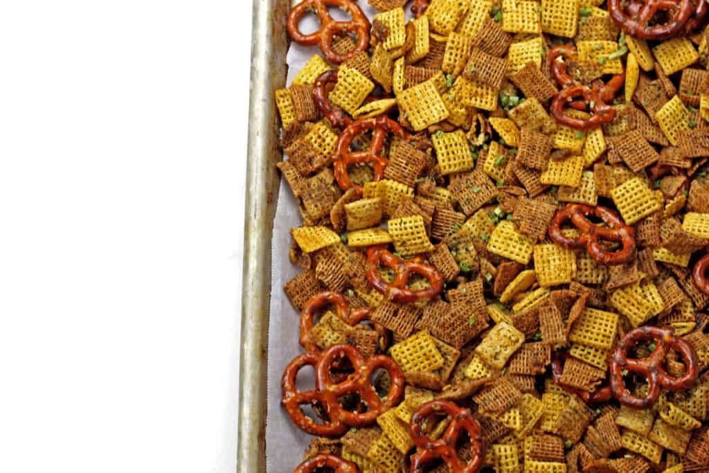 Ranch chex mix cooling on a sheet pan