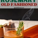 Pinterest image of the cocktail with the text "Smoked Rosemary Old Fashioned".