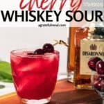 Pinterest image of the cocktail with the words "Best Cherry Whiskey Sour" in text overlay.