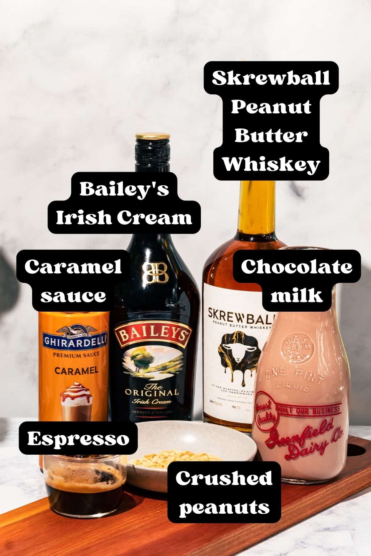 Ingredients for the Irish Latte laid out on a wood surface.