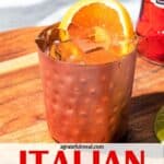 Pinterest image of the cocktail with the words “Italian Aperol Mule” in text overlay.