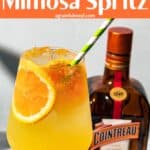 Pinterest image of spritz cocktail with the words "Cointreau Mimosa Spritz" in text overlay.