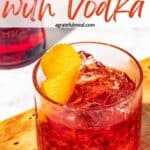 Pinterest image of the cocktail with the words "Negroni with Vodka" in text overlay.