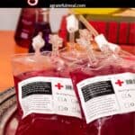 Pinterest image of the cocktails with the words "Spooky Blood Bag Cocktails" in text overlay.