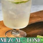 Pinterest image of the cocktail with the words "Mezcal + Tonic Cocktail" in text overlay.