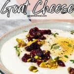 Pinterest image of the dip in a bowl with the words "Whipped Goat Cheese" in text overlay.