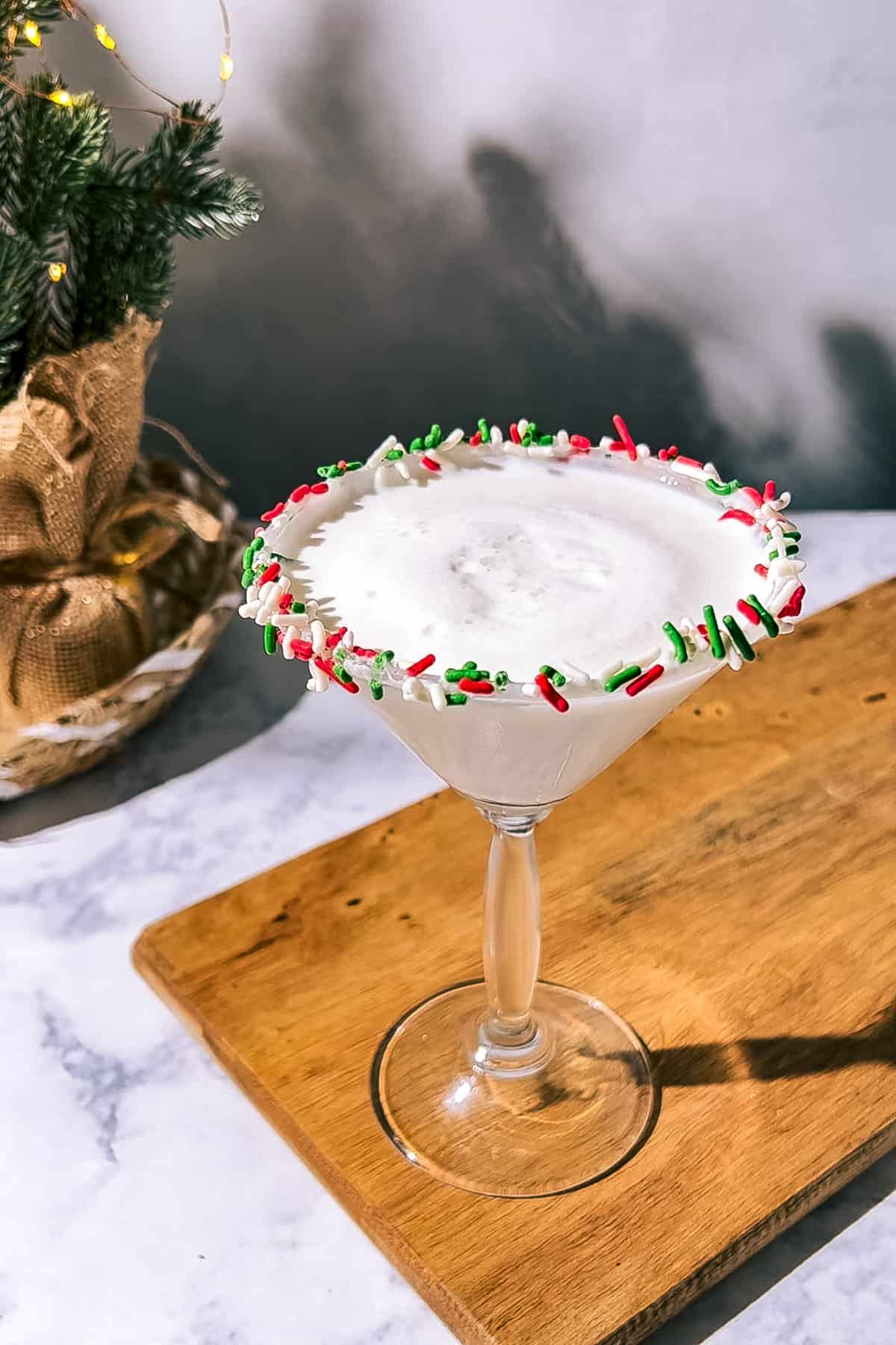 Sugar cookie martini garnished with a sprinkle rim.