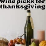 Pinterest image of a bottle of wine and fruit with the words "easy + simple wine picks for thanksgiving" in text overlay.