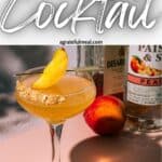 Pinterest image of the cocktail with the words "Peach Cobbler Vodka Cocktail" in text overlay.