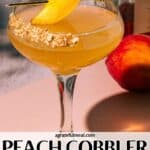 Pinterest image of the cocktail with the words "Peach Cobbler Vodka Martini" in text overlay.