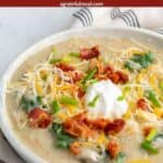 Pinterest image of the soup with the words "Potato Soup with Kale and Leeks" in text overlay.