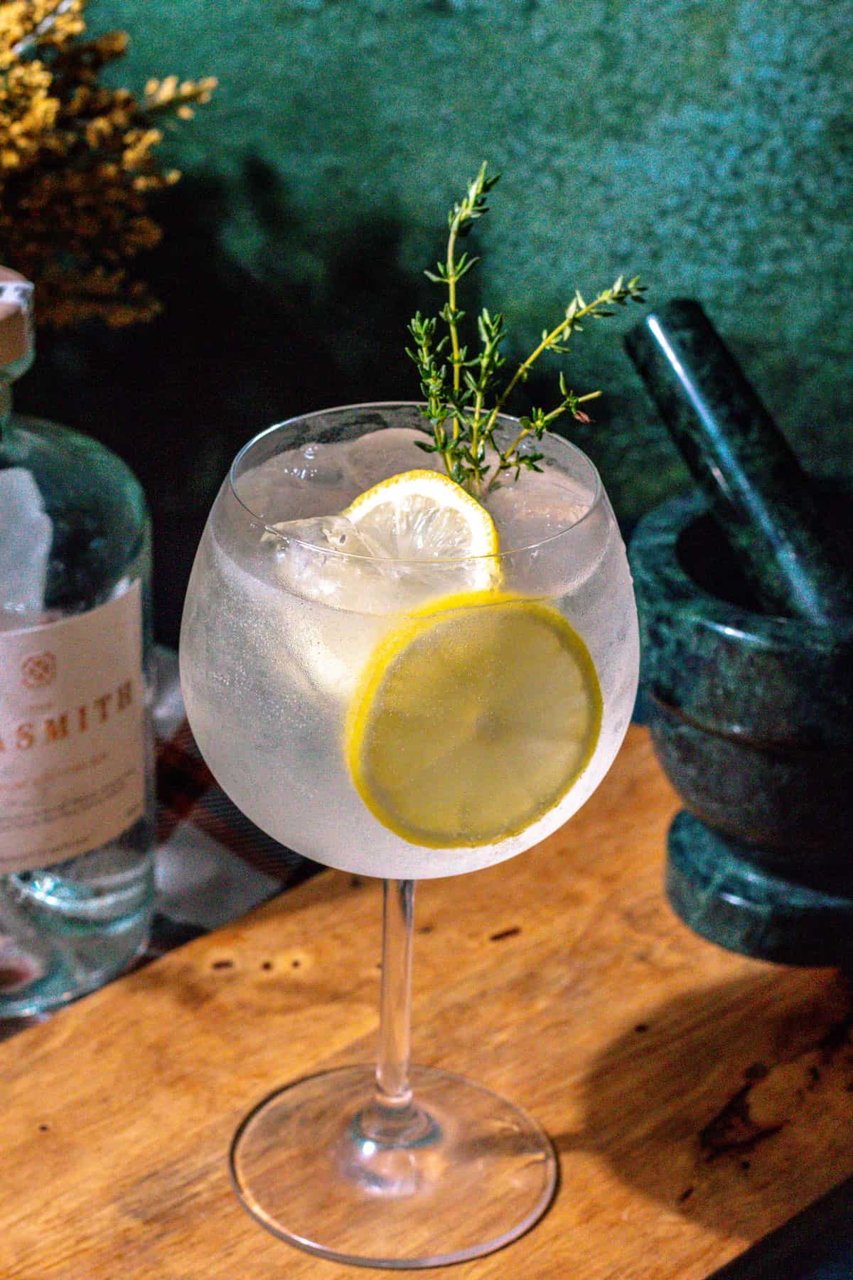 Healer's Tonic garnished with lemon and thyme.