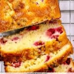 Pinterest image of the cake with the words "White Chocolate Raspberry Loaf" in text overlay.