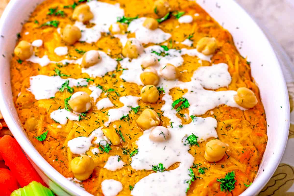 Ranch dressing drizzled on top of the dip.