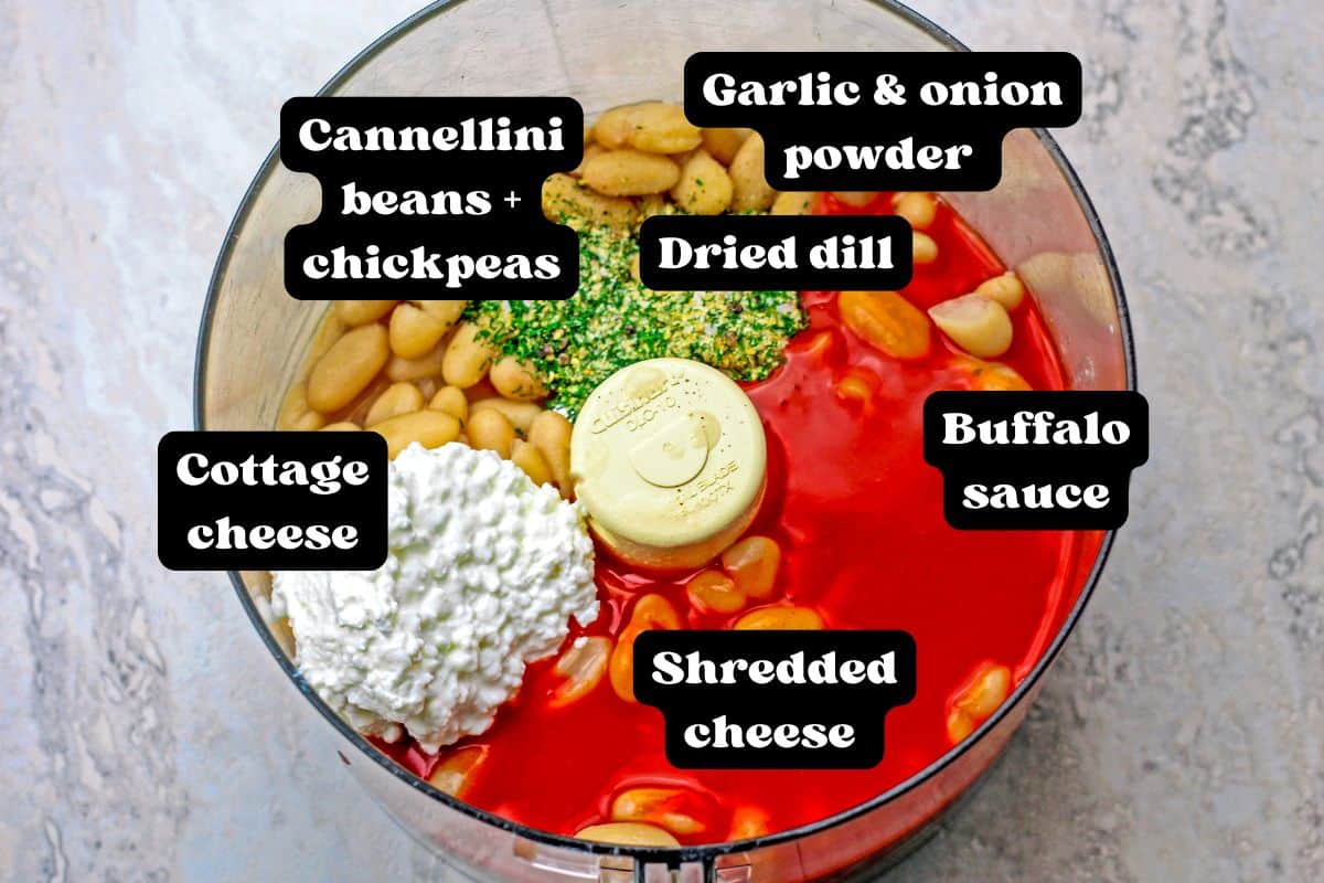 Ingredients for the dip in a food processor bowl.